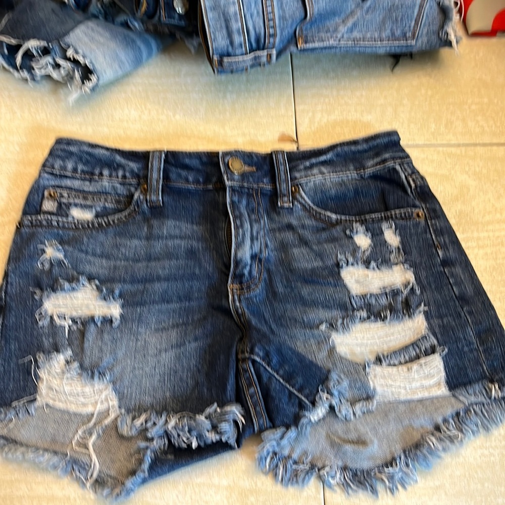 Justusa blue ripped jean shorts